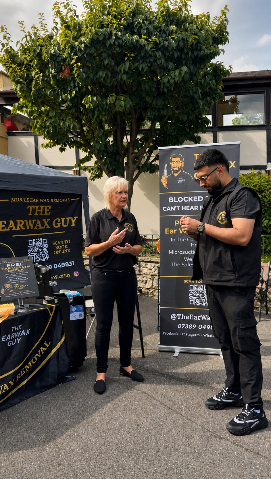The Earwax Guy team at a community ear care event